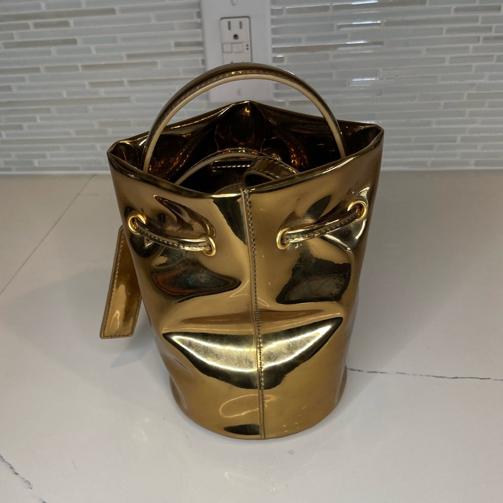 Brandon Blackwood Kamala gold metallic bucket bag